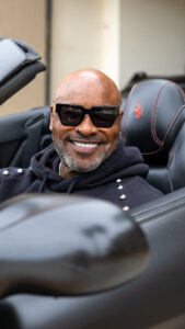 Colin F Watson in his Ferrari